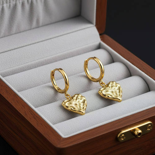 Aros Huggie Chunky Corazón 'Croissant' Texturizados en Plata de Ley 925 y Baño de Oro 18K